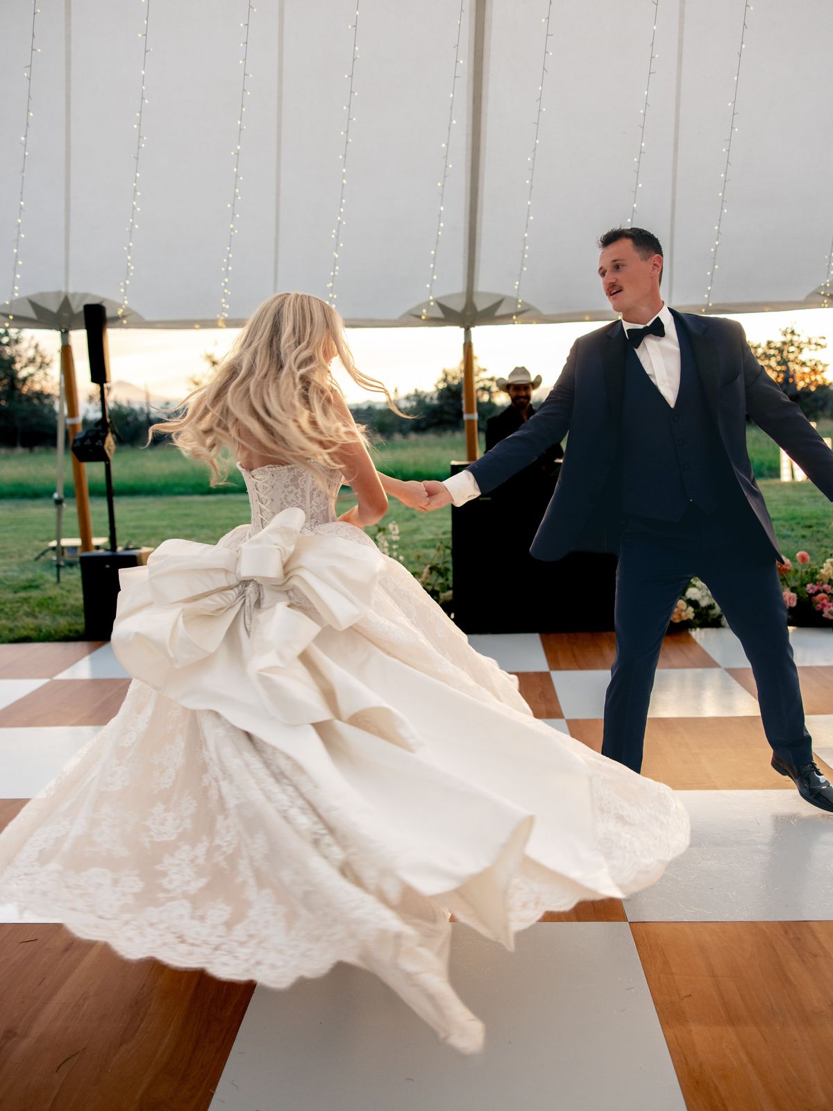 First dance on the checkered floor, DJ in the background