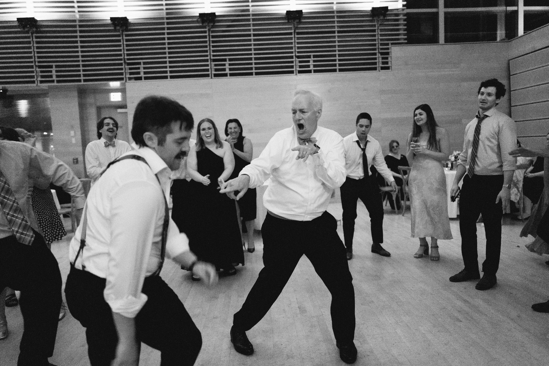 An uncle taking the floor like it is his wedding too