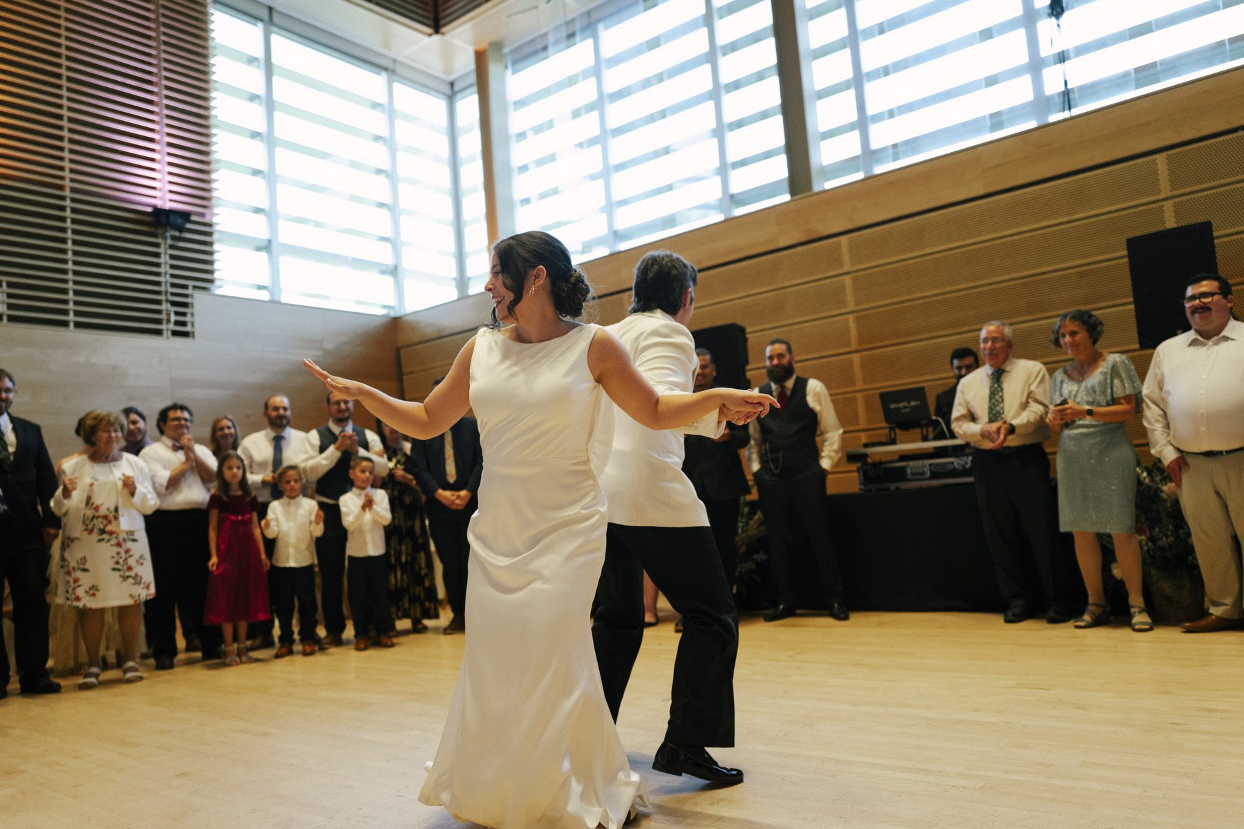 Color first dance, guests lined around the floor