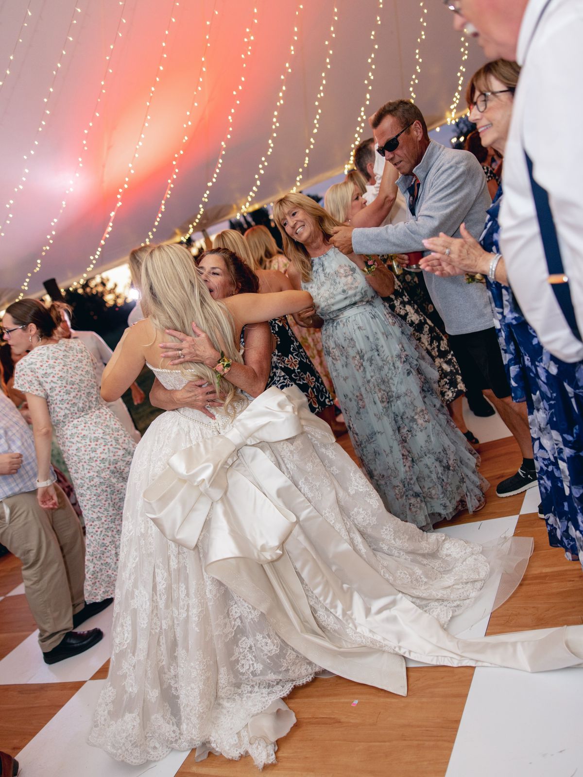 Bride hugged on the dance floor