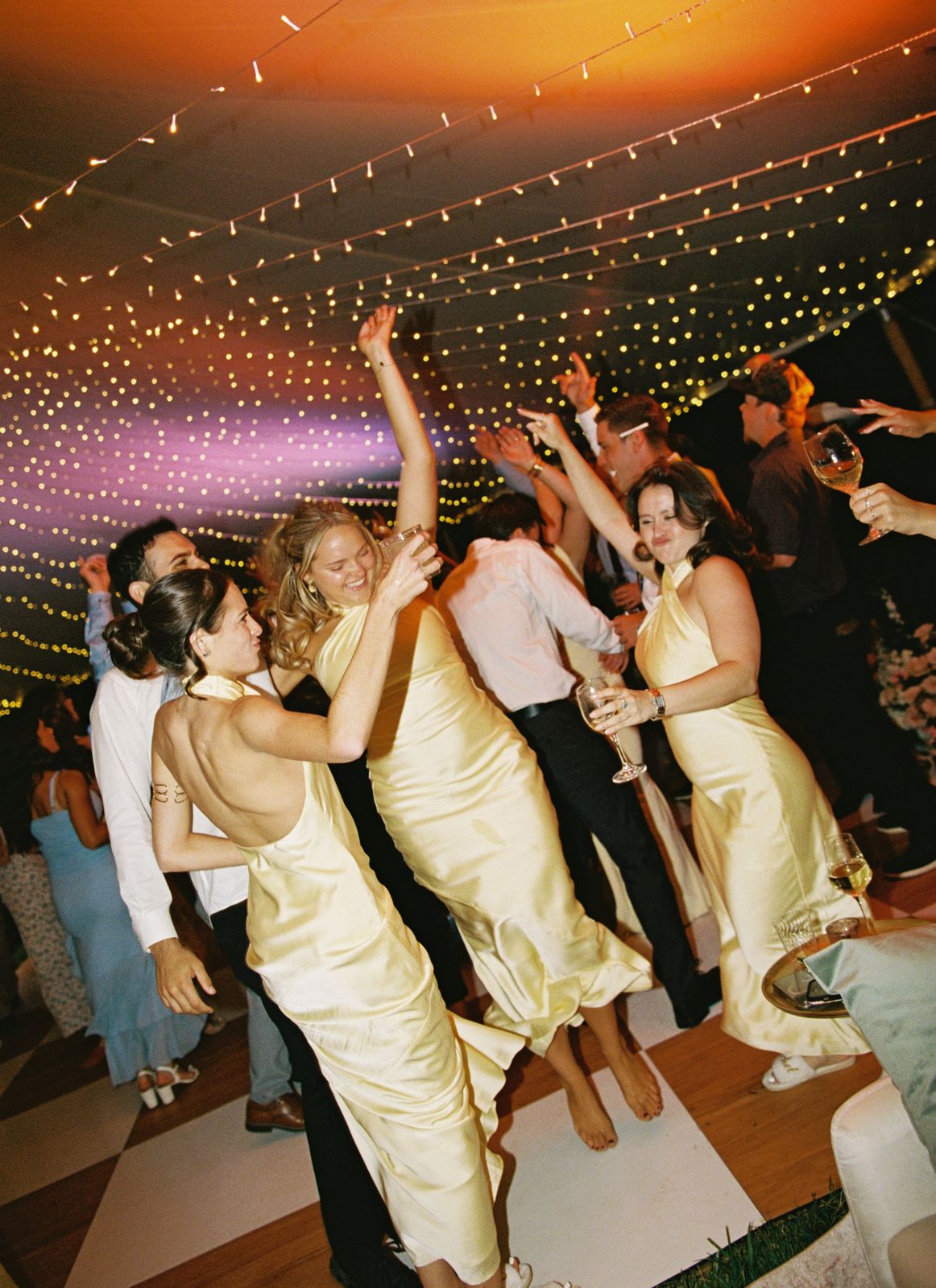 Yellow dresses, packed tent