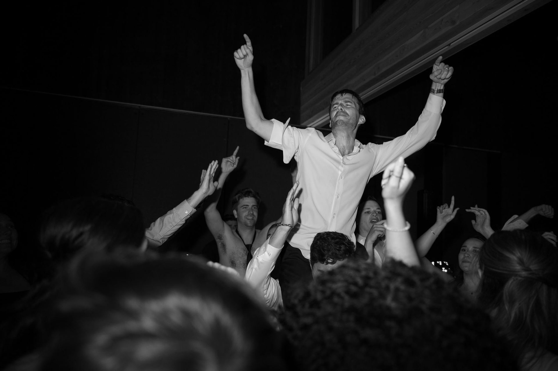 Hands in the air under the lights