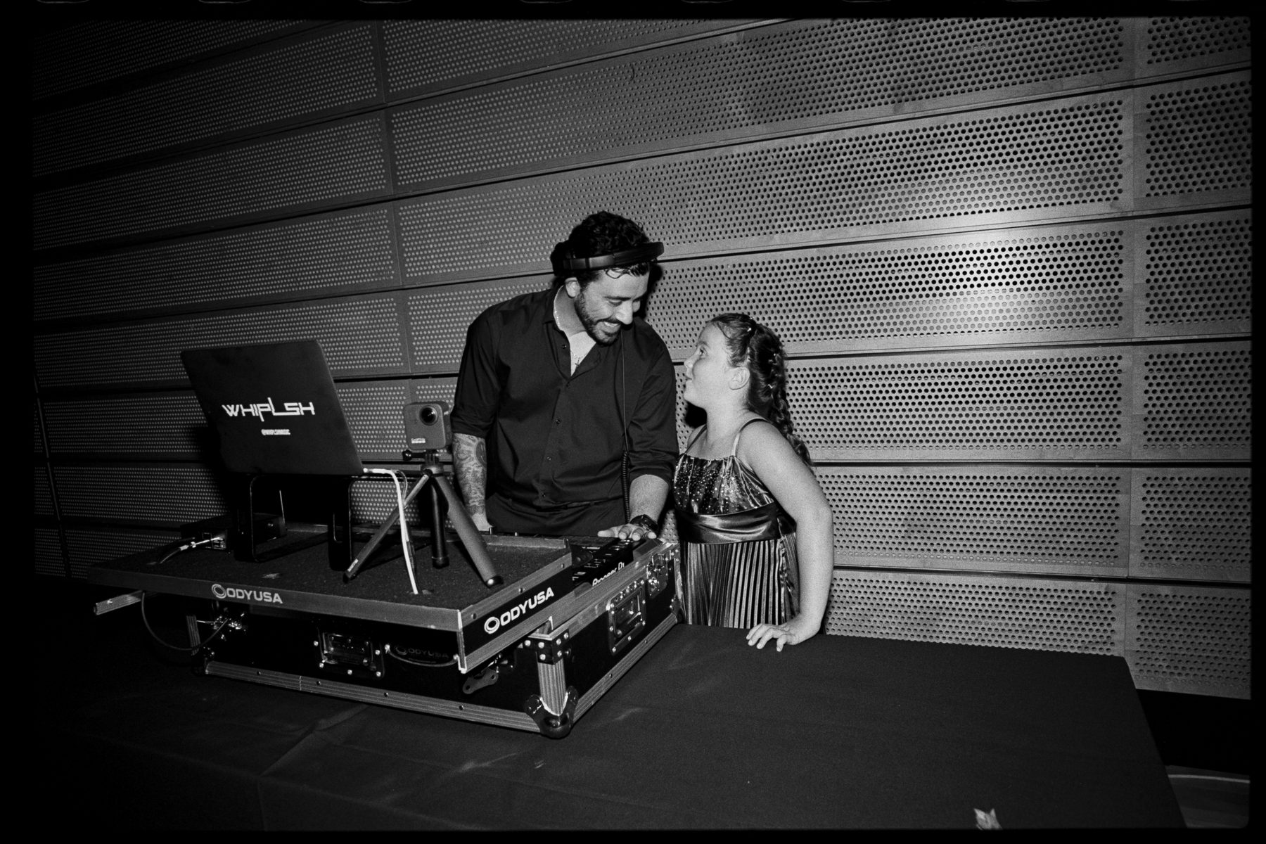 A guest at the booth with WHIPLSH, Pioneer decks and the WHIPLSH laptop